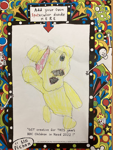 A Phase 1 pupil's drawing of Pudsey Bear is seen displayed on a wall in celebration of BBC Children In Need 2022.