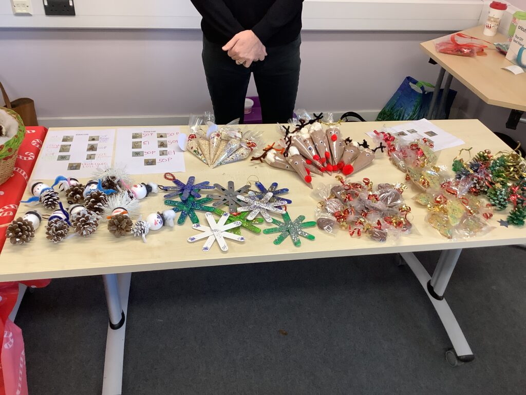 A photo of some Christmas art items that have been created by Milestone Academy students for the Phase 4 Christmas Craft Fair.