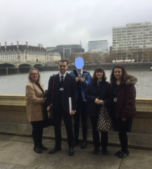 Students stood outside the Houses of Parliament